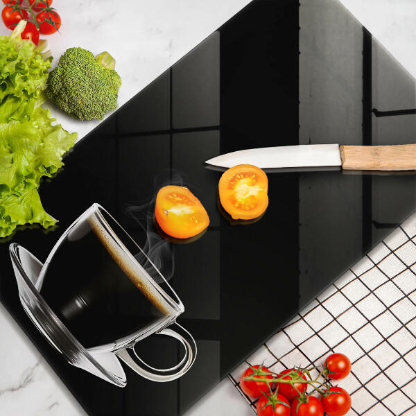 Tagliere in vetro Un bicchiere di caffè caldo