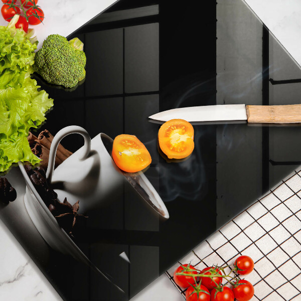 Tagliere in vetro Una tazza di caffè caldo