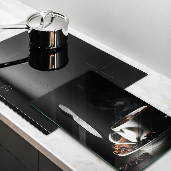 Tagliere in vetro Una tazza di caffè caldo