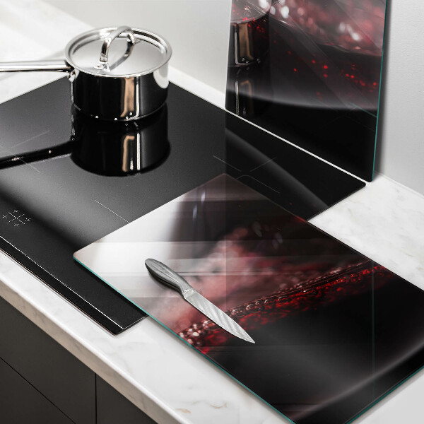 Tagliere in vetro temperato Vino rosso in un bicchiere