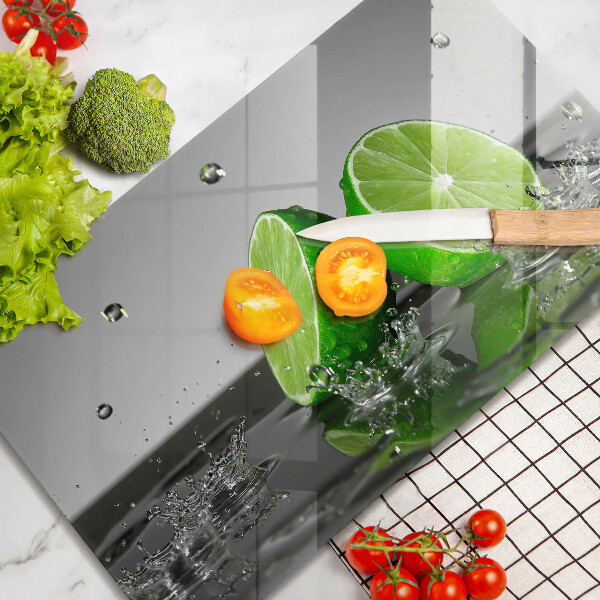 Tagliere in vetro Lime succosi e acqua