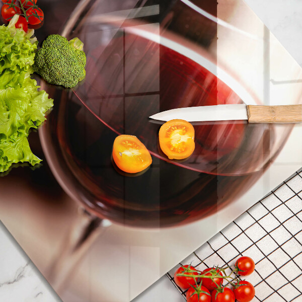 Tagliere in vetro Un bicchiere di vino rosso