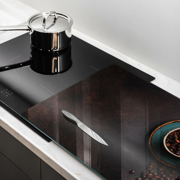 Tagliere in vetro Una tazza di chicchi di caffè