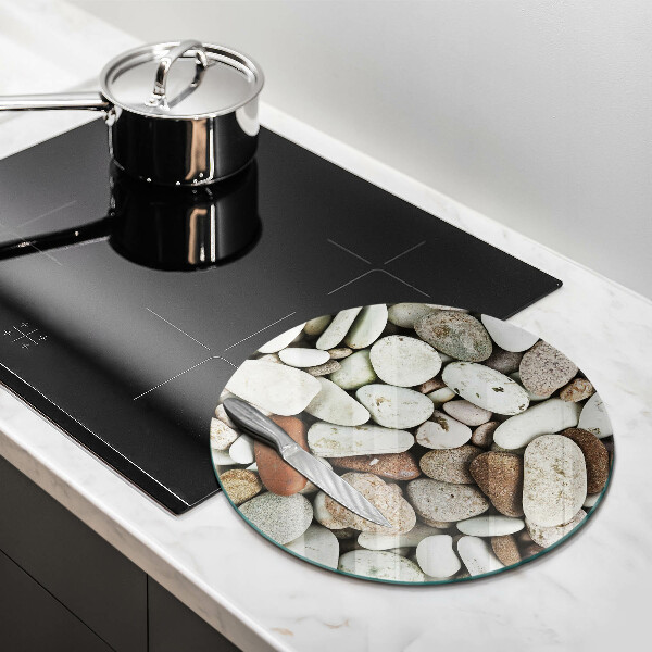 Tagliere in vetro Sfondo di piccole pietre