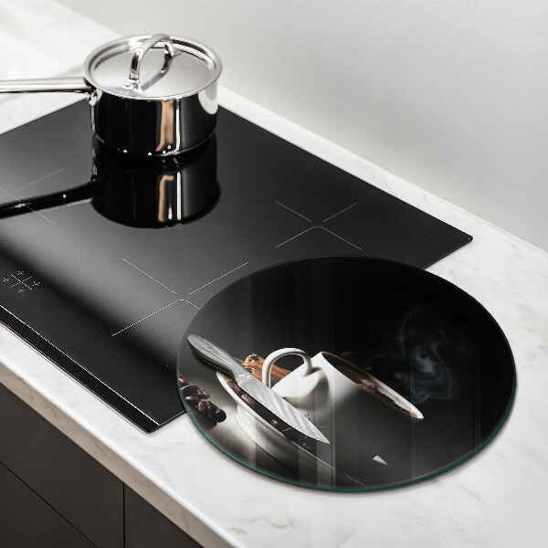 Tagliere in vetro Una tazza di caffè caldo