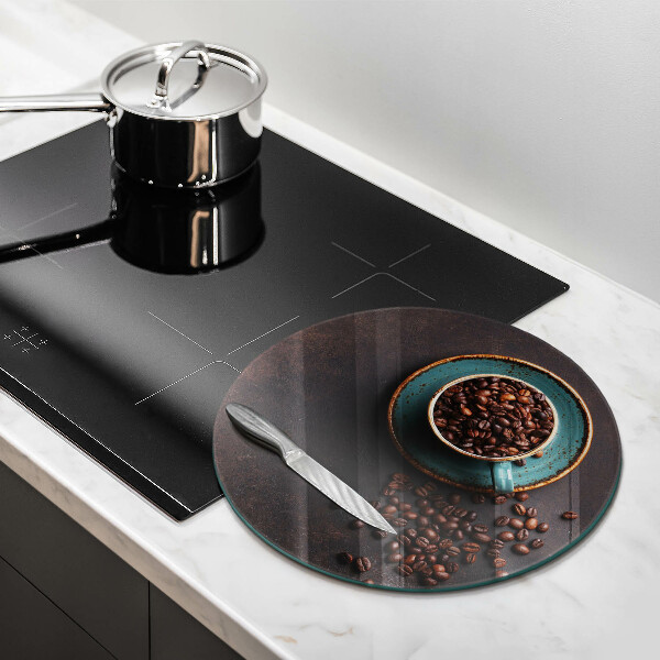 Tagliere in vetro temperato Una tazza di chicchi di caffè