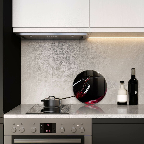 Tagliere in vetro Un bicchiere di vino rosso