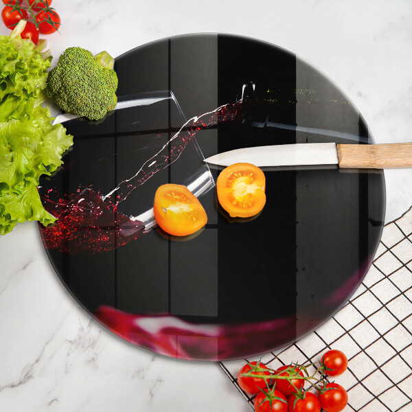 Tagliere in vetro Un bicchiere di vino rosso