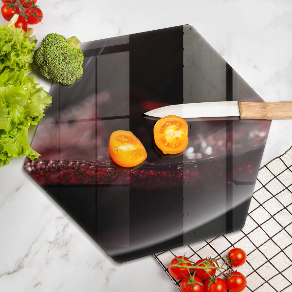 Tagliere in vetro temperato Vino rosso in un bicchiere