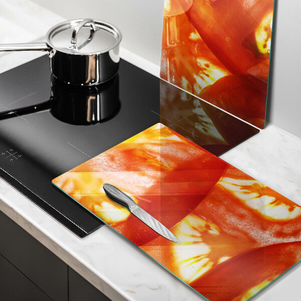 Copri piano cottura Una fetta di pomodoro rosso