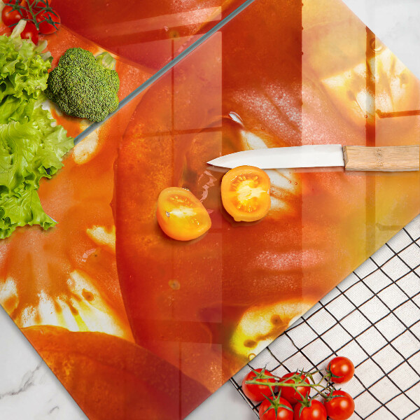 Copri piano cottura Una fetta di pomodoro rosso