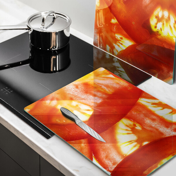 Copri piano cottura Una fetta di pomodoro rosso