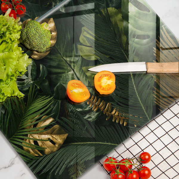 Copri piano cottura in vetro Foglie dorate di monstera