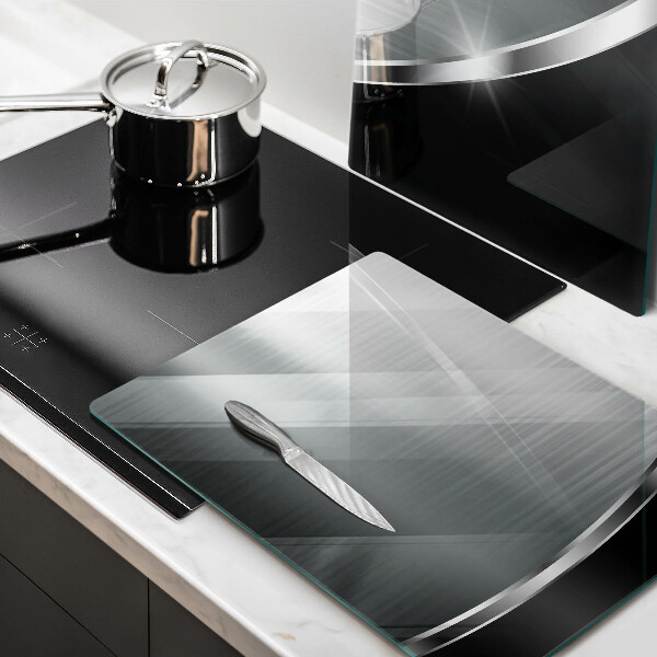 Copri piano cottura in vetro Astrazione con metallo
