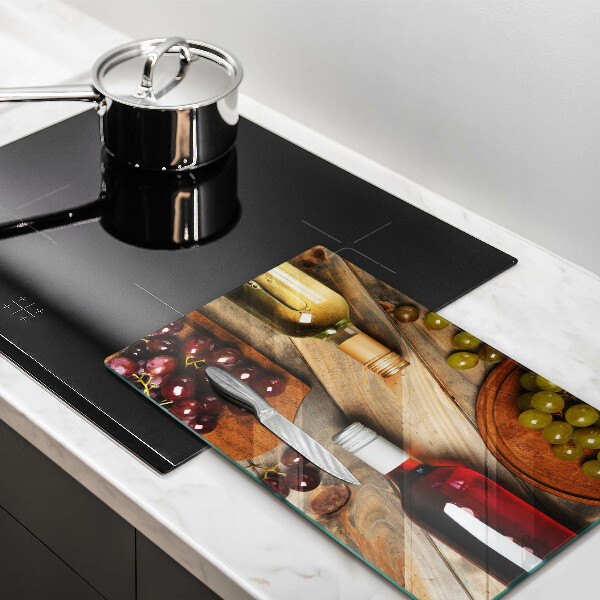 Copri piano cottura Bottiglie di vino e uva