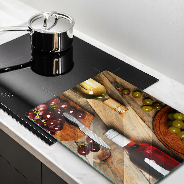 Copri piano cottura Bottiglie di vino e uva