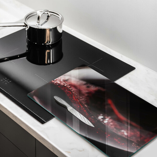 Copri piano induzione Vino rosso in un bicchiere