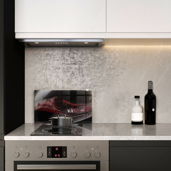 Copri piano induzione Vino rosso in un bicchiere