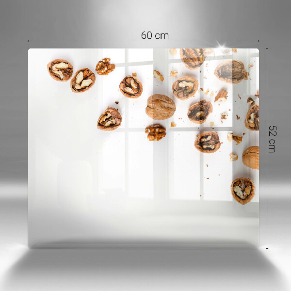 Copertura piano induzione Noci su sfondo bianco