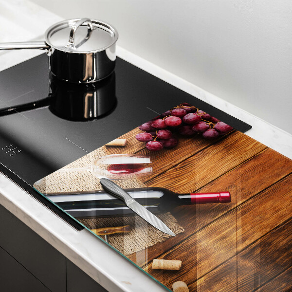 Protezione piano cottura Una bottiglia di vino rosso