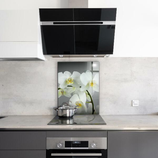 Rivestimento parete cucina Orchidea bianca su sfondo nero