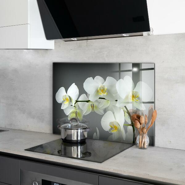Rivestimento parete cucina Orchidea bianca su sfondo nero
