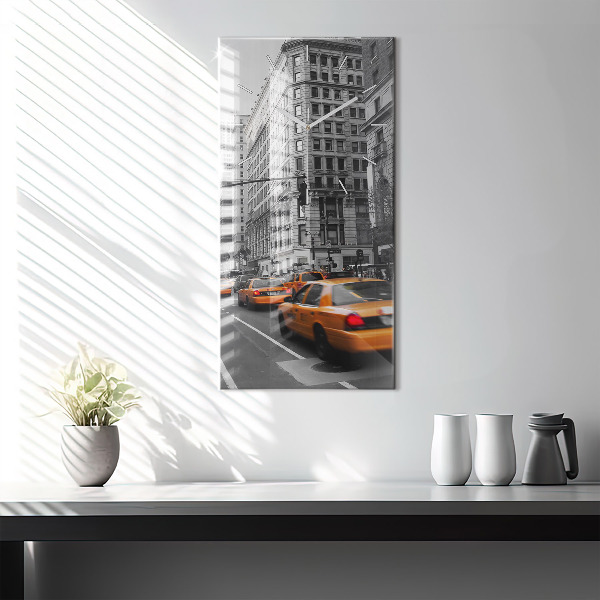 Orologio verticale Manhattan e i taxi