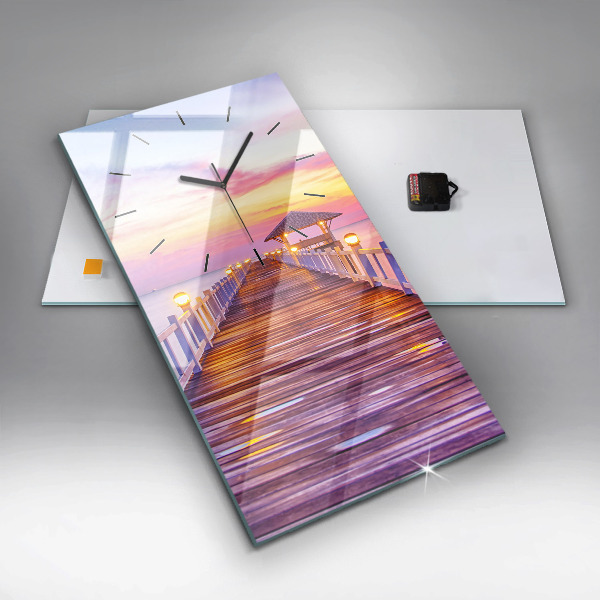 Orologio verticale Il ponte del porto di sera