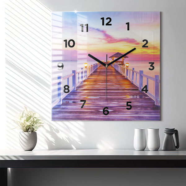 Orologio quadrato Il ponte del porto di sera