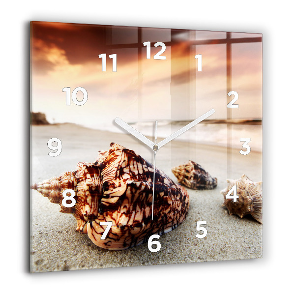 Orologio quadrato Una conchiglia sulla spiaggia