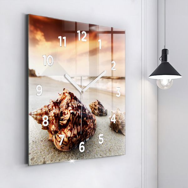 Orologio quadrato Una conchiglia sulla spiaggia