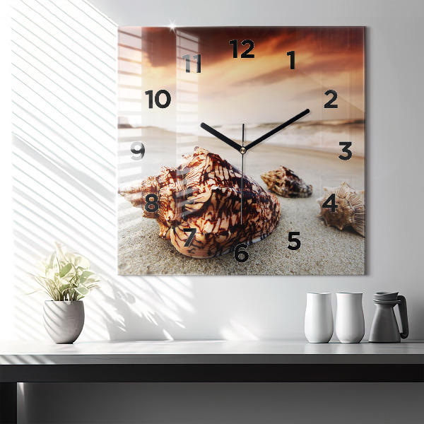 Orologio quadrato Una conchiglia sulla spiaggia
