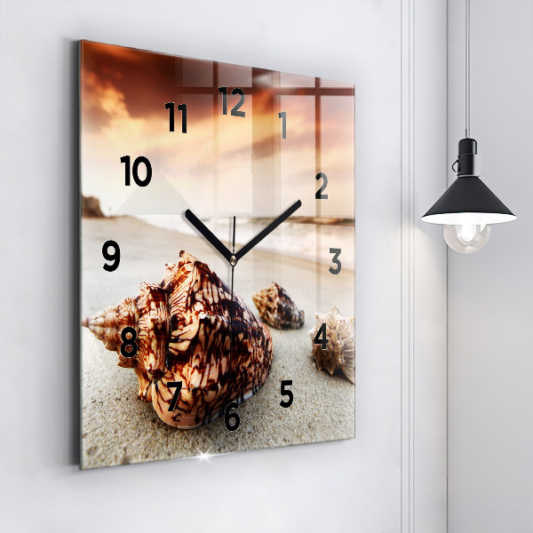 Orologio quadrato Una conchiglia sulla spiaggia