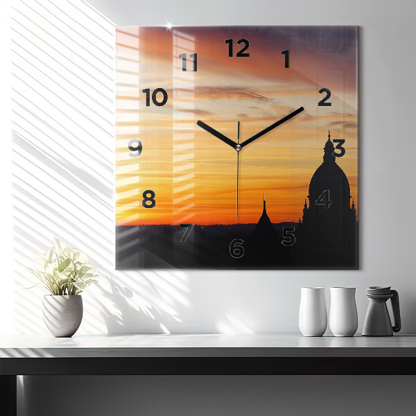 Orologio quadrato in vetro Edificio e tramonto