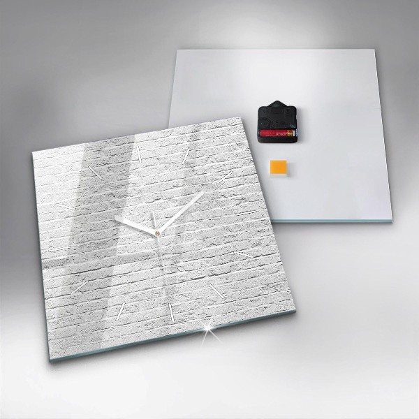 Orologio quadrato Un muro di mattoni leggeri