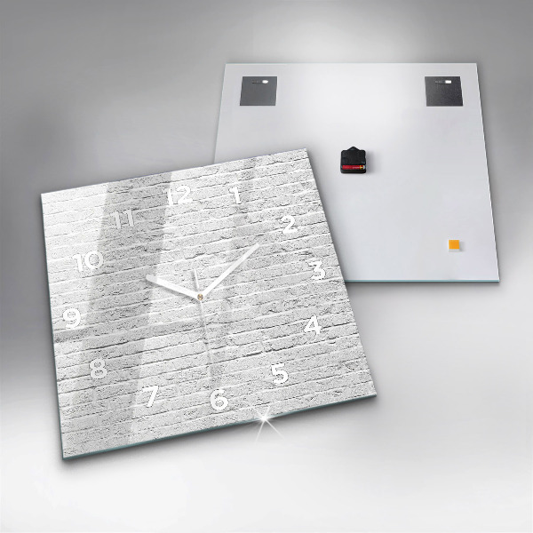 Orologio quadrato Un muro di mattoni leggeri