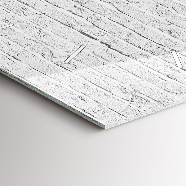 Orologio quadrato Un muro di mattoni leggeri