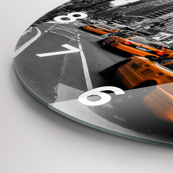 Orologio rotondo Manhattan e i taxi