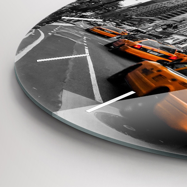 Orologio rotondo Manhattan e i taxi