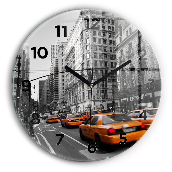 Orologio rotondo Manhattan e i taxi