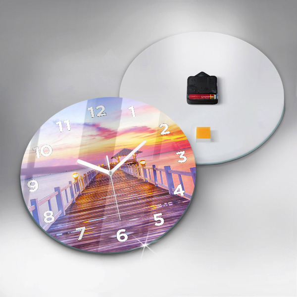 Orologio rotondo Il ponte del porto di sera