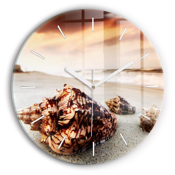 Orologio rotondo Una conchiglia sulla spiaggia