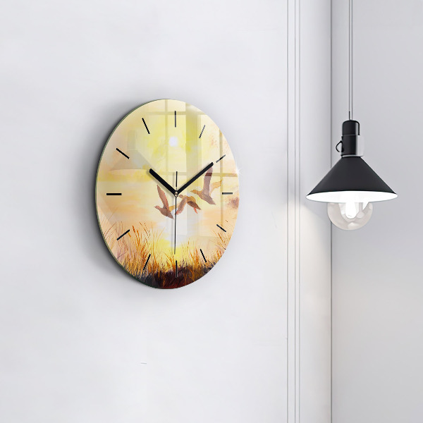 Orologio rotondo Gru al tramonto