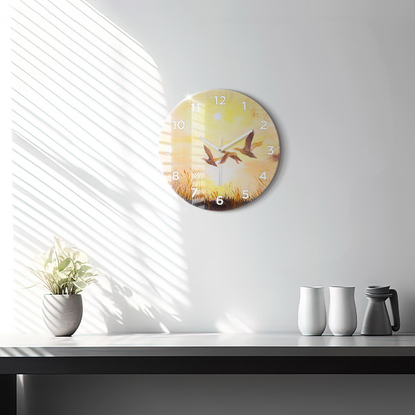 Orologio rotondo Gru al tramonto