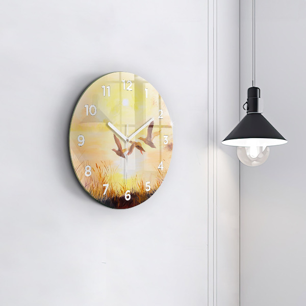 Orologio rotondo Gru al tramonto