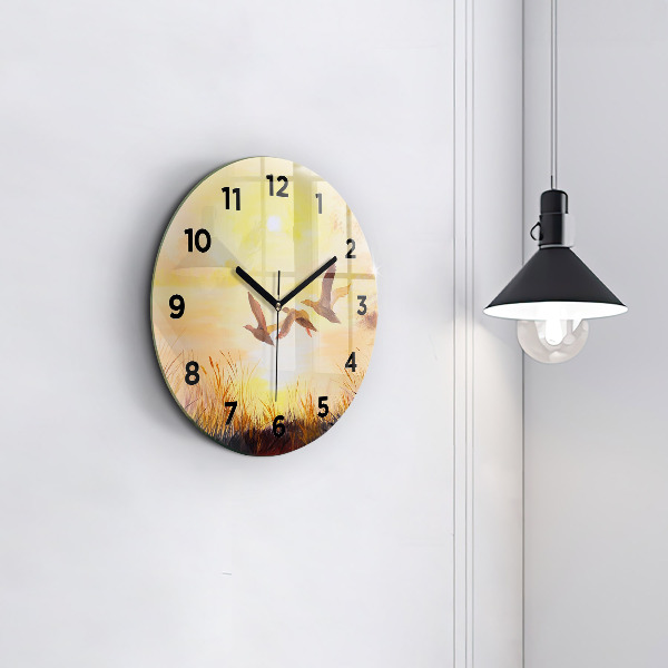 Orologio rotondo Gru al tramonto