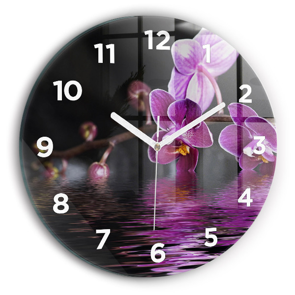 Orologio rotondo Fiore di orchidea sull'acqua