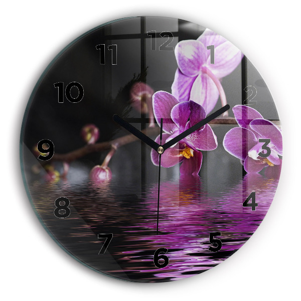 Orologio rotondo Fiore di orchidea sull'acqua