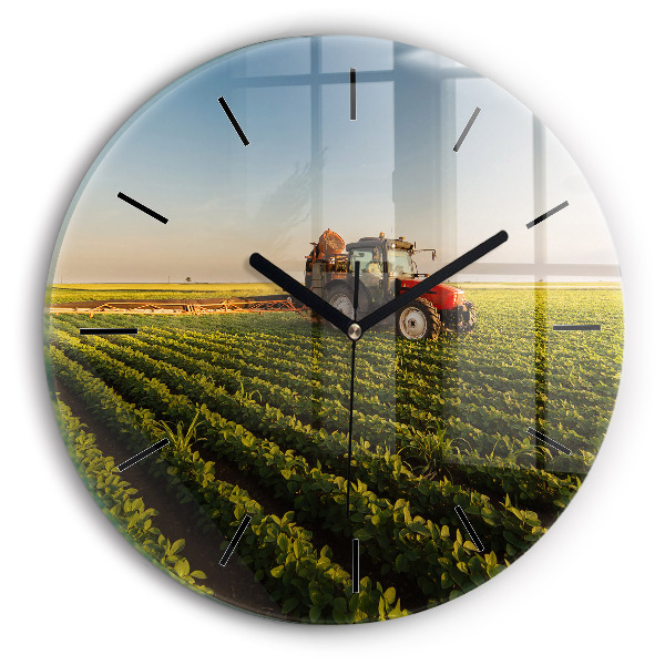 Orologio rotondo in vetro Trattore in un campo agricolo