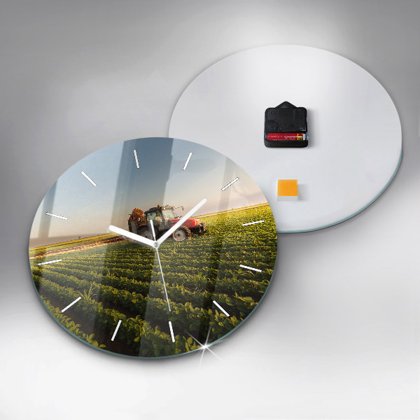 Orologio rotondo in vetro Trattore in un campo agricolo